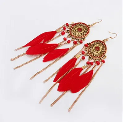 Araadil - Long Boho Feather Earrings by The Nevermore
