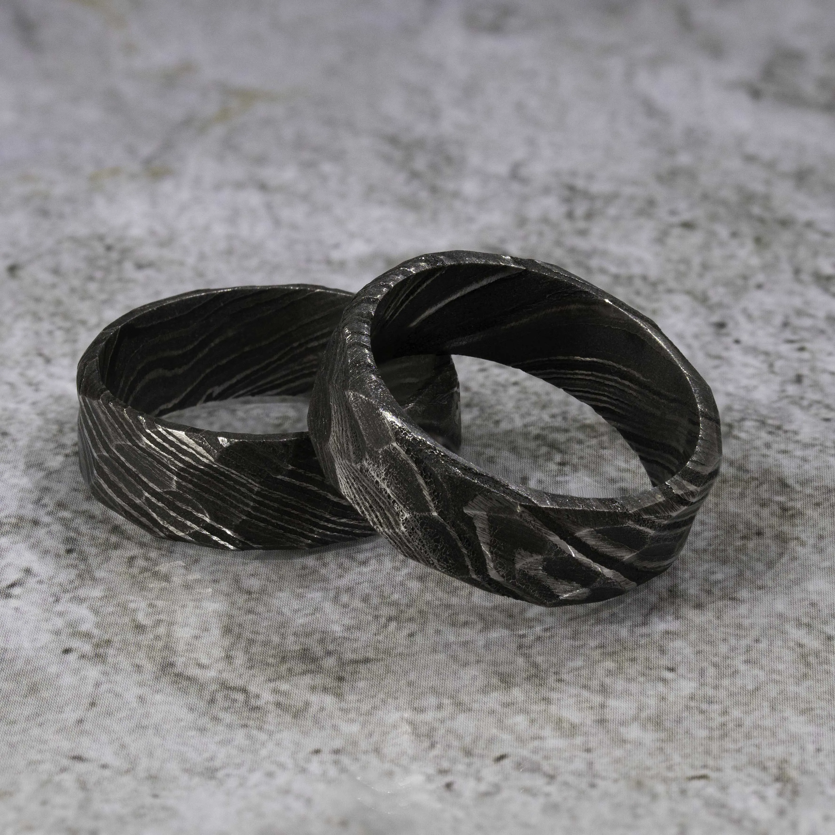 Damascus Steel Ring with Rock Hammer Finish